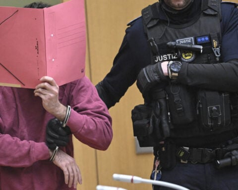 Afghan man goes on trial in Germany after fatal stabbing at political rally