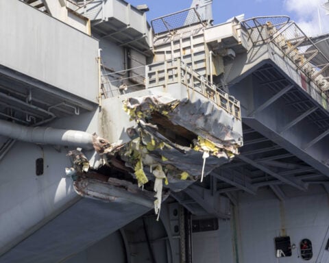 US aircraft carrier Truman collides with merchant ship near Egypt, but no injuries are reported