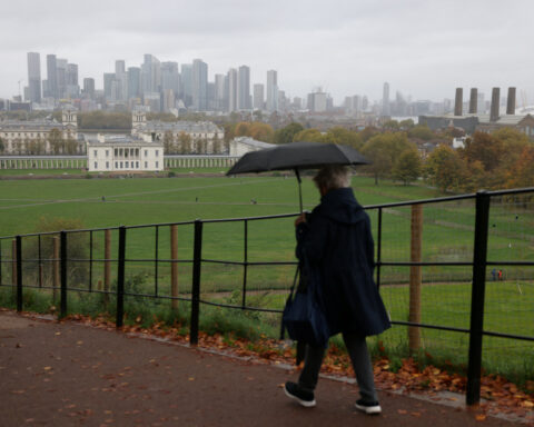 UK firms brace for hit from tax hikes, surveys show