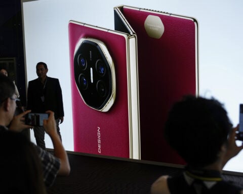 Huawei's tri-foldable phone hits global markets in a show of defiance amid US curbs