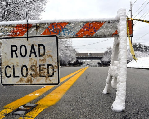 SNOW AND RECORD COLD HINDER ONGOING FLOOD RESCUES (4aET)