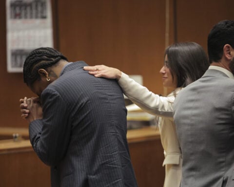 A$AP Rocky dives into Rihanna's arms as not guilty verdict is read at felony assault trial