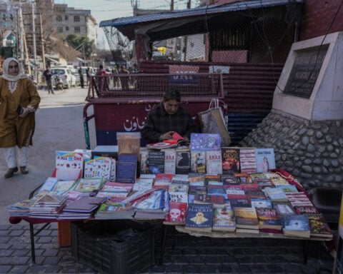Police in disputed Kashmir raid bookstores, seizing books related to Islamic group