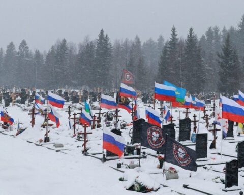 In Russian town, monument to fallen soldiers shows toll of three years of war