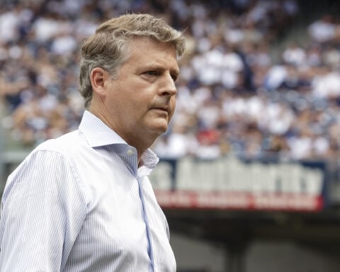 Yankees owner Hal Steinbrenner may support a salary cap proposal tied to payroll minimum