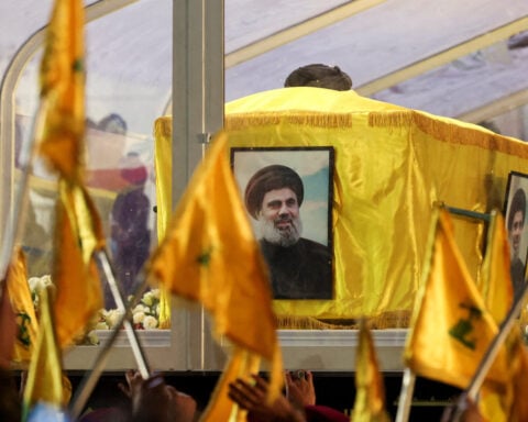 Massive crowds mourn Hezbollah's slain leader Nasrallah