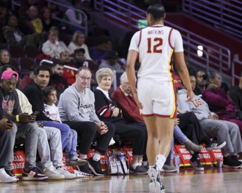 Wojnarowski auctions iPhones used for 'Woj bombs' to raise NIL money at St. Bonaventure