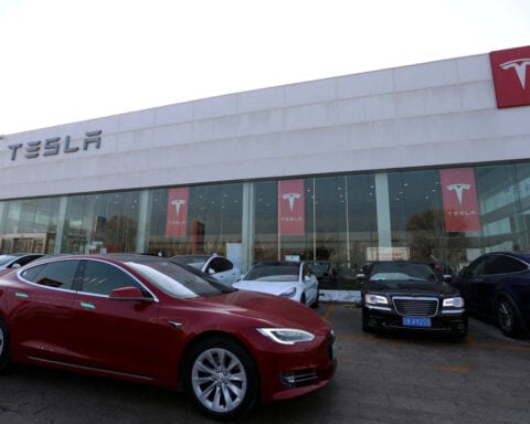 Tesla updates autopilot software in China, owners say move falls short of hopes