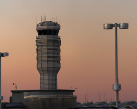 American Airlines flight discontinues landing to avoid departing plane at Washington National