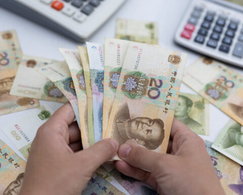 China steps up scrutiny of capital flows as yuan depreciates