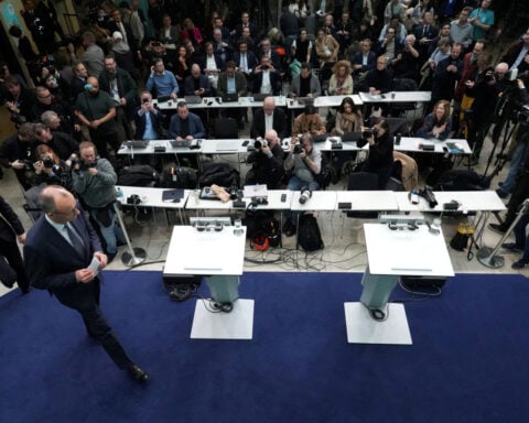 German poll winner Merz's abrasive style could hamper coalition building