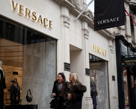 Miuccia Prada says 'everybody' interested in buying Versace