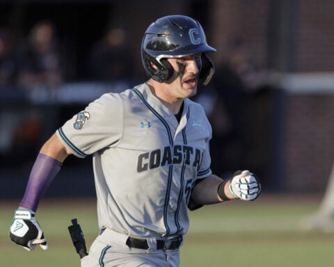 An ex-minor league catcher was accused of trying to lose on purpose. He says he didn't tip pitches