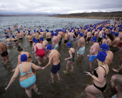 Cold-water swimmers in the Czech Republic set a new world record for the largest polar bear dip