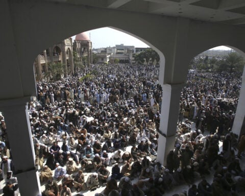 Thousands of mourners attend funeral of Taliban-linked cleric killed in Pakistan suicide blast