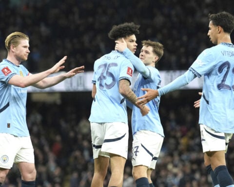 Man City gets past Plymouth to reach FA Cup quarters. Millwall keeper sent off for wild challenge