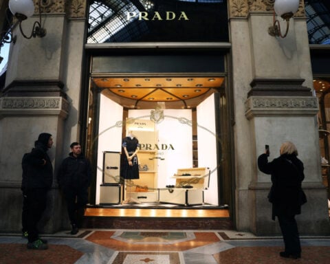 Versace would widen Prada's reach but fixes could hit short-term profits