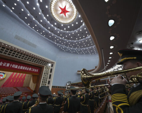 China slaps extra tariffs of up to 15% on imports of major US farm exports and adds trade limits
