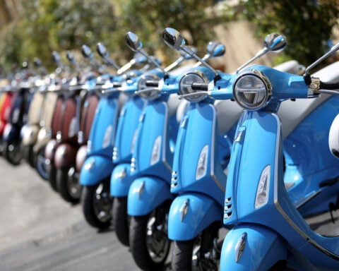 Vespa maker Piaggio posts record margin despite 'anomalous' economy