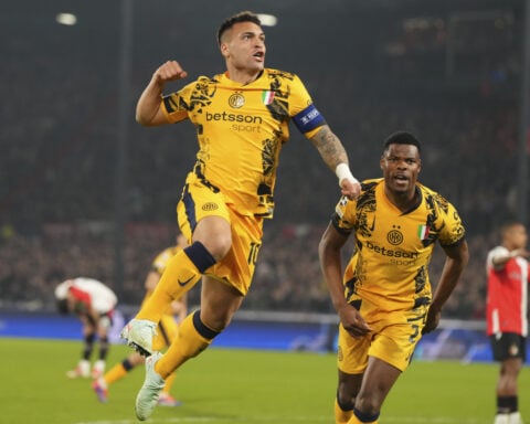 Liverpool stuns PSG with late winner in Champions League and 10-man Barcelona beats Benfica