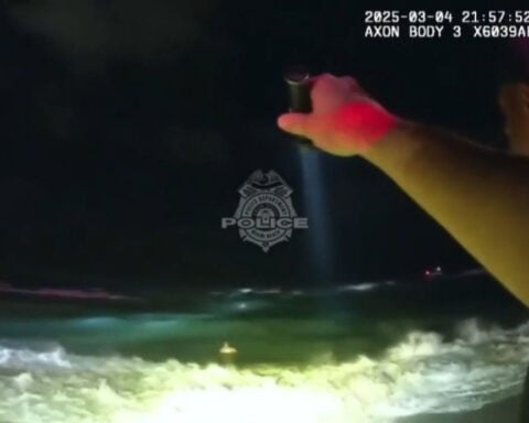 Bodycam video shows police officers rescuing 2 swimmers in ‘extremely dangerous conditions’