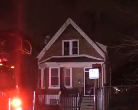 Man jumps from burning home