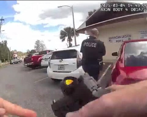 Police provide details after video shows officer pointing gun in the direction of child