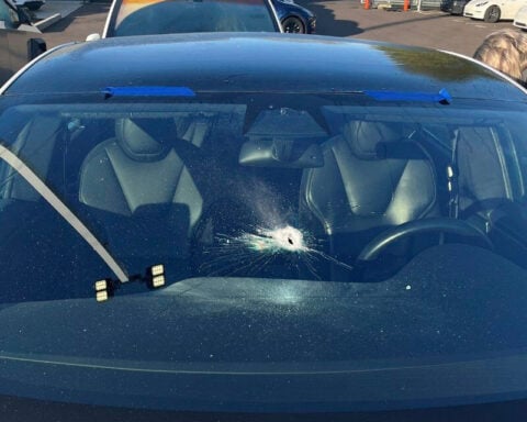 Oregon police investigate nighttime gunshots that shattered windows at a Tesla dealership