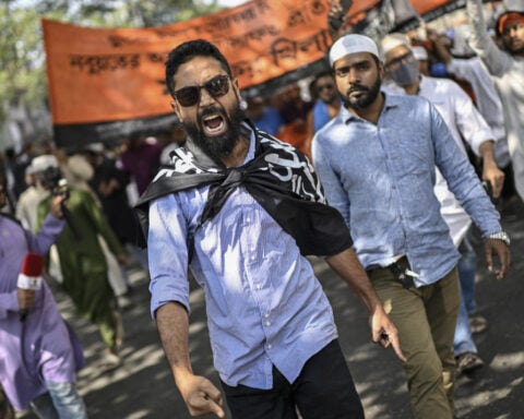 Police in Bangladesh use batons and tear gas to disperse rally by banned Islamist group