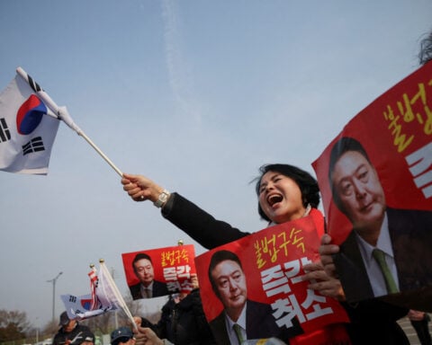 South Korea's President Yoon free, trials continue after court quashes detention