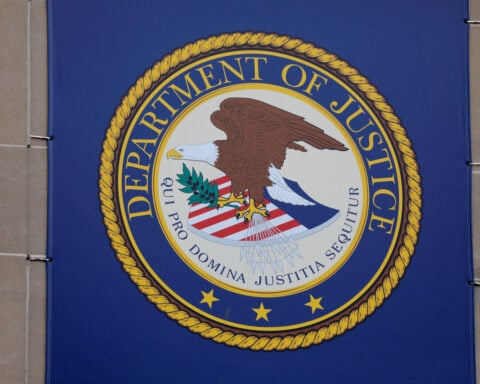 Trump Justice Department fires more career officials