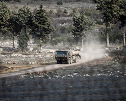 Israel says it will let Syrian Druze workers cross into Golan Heights