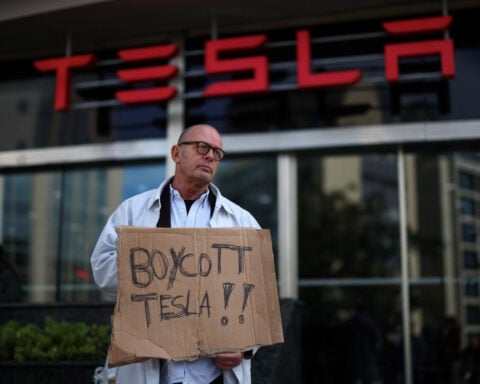 Dozens protest at Tesla showroom in Portugal ahead of likely snap election