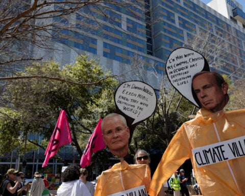 Climate activists protest at top global energy gathering