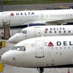 US airline stocks tumble as Delta's forecast cut spooks investors