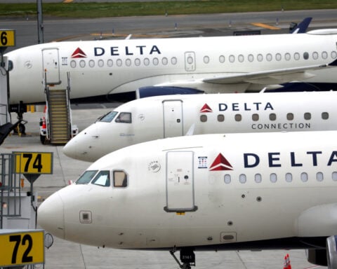 US airline stocks tumble as Delta's forecast cut spooks investors