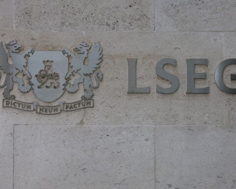 Tariff threats, travel stocks drag UK stocks lower