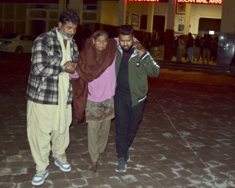 Pakistani insurgents attack a train carrying hundreds of people and take hostages