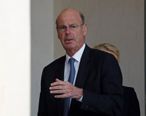 French defence build-up must not push finances off course, minister says