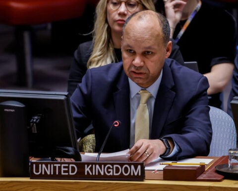Britain warns Iran sanctions could be reimposed as UN Security Council meets