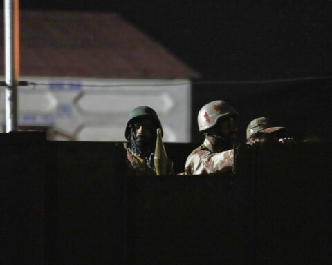 Pakistan says insurgents who attacked a passenger train killed 21 hostages while all others freed