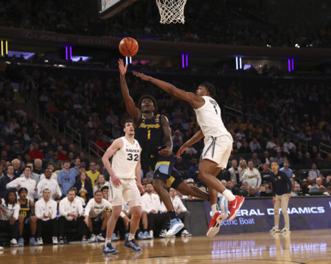 Jones scores 28 as No. 25 Marquette rallies past Xavier 89-87 in Big East quarterfinal