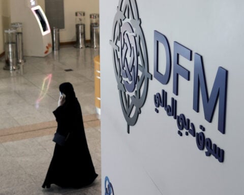 Dubai declines over new tariff threats, oil holds Abu Dhabi