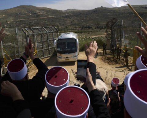Dozens of Syrian Druze make a rare visit to Israeli-controlled Golan Heights