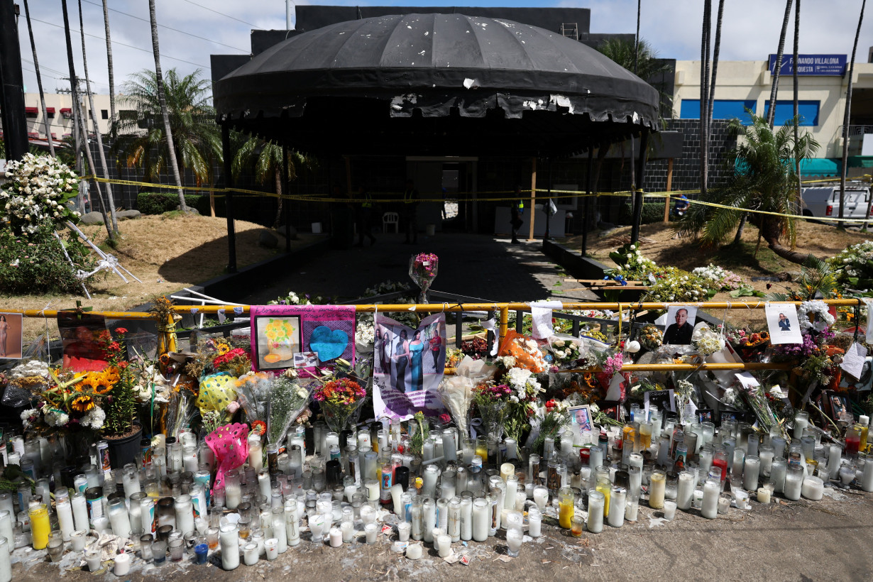 A makeshift memorial stands outside the remains of the Jet Set nightclub after a deadly roof collapse, in Santo Domingo