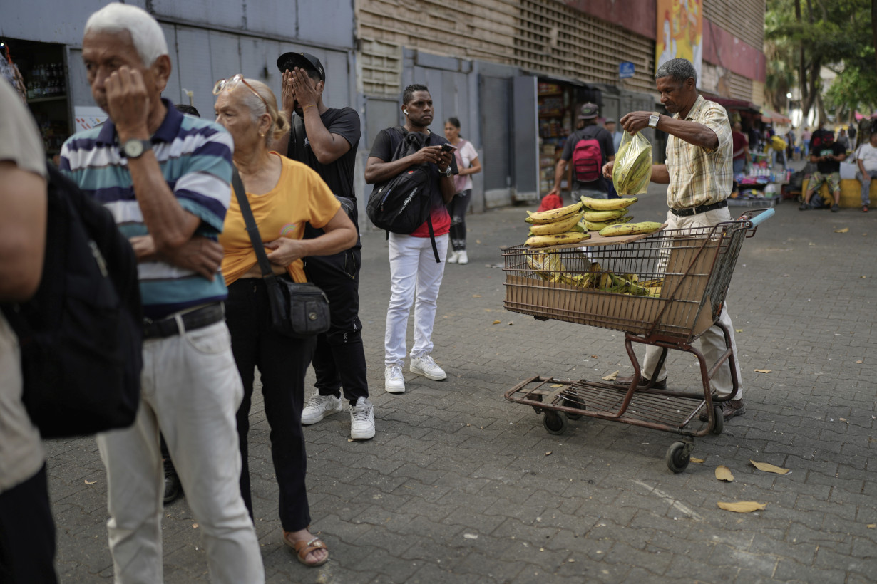 Inflation, currency woes worsen Venezuela's complex crisis as Maduro declares 'economic emergency'