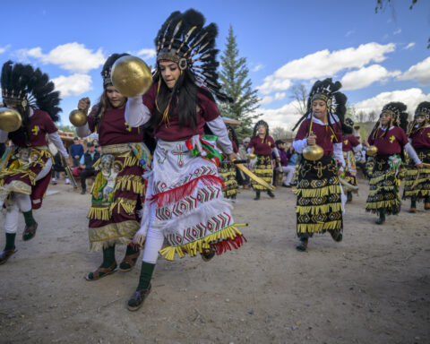 Thousands of pilgrims trek through New Mexico desert to historic adobe church for Good Friday
