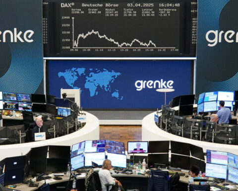 European shares end higher ahead of week's data, earnings
