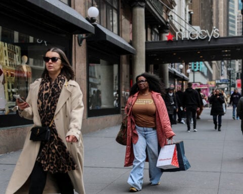 US consumer spending surges in March, inflation cools