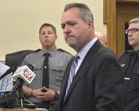 Officer killed in gunman's Pennsylvania hospital siege was felled by police fire, prosecutor says